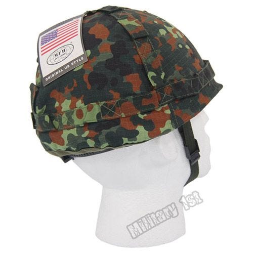 Casco de plástico MFH con funda de tela de camuflaje en Flecktarn