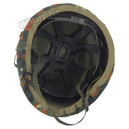 Casco de plástico MFH con funda de tela de camuflaje en Flecktarn